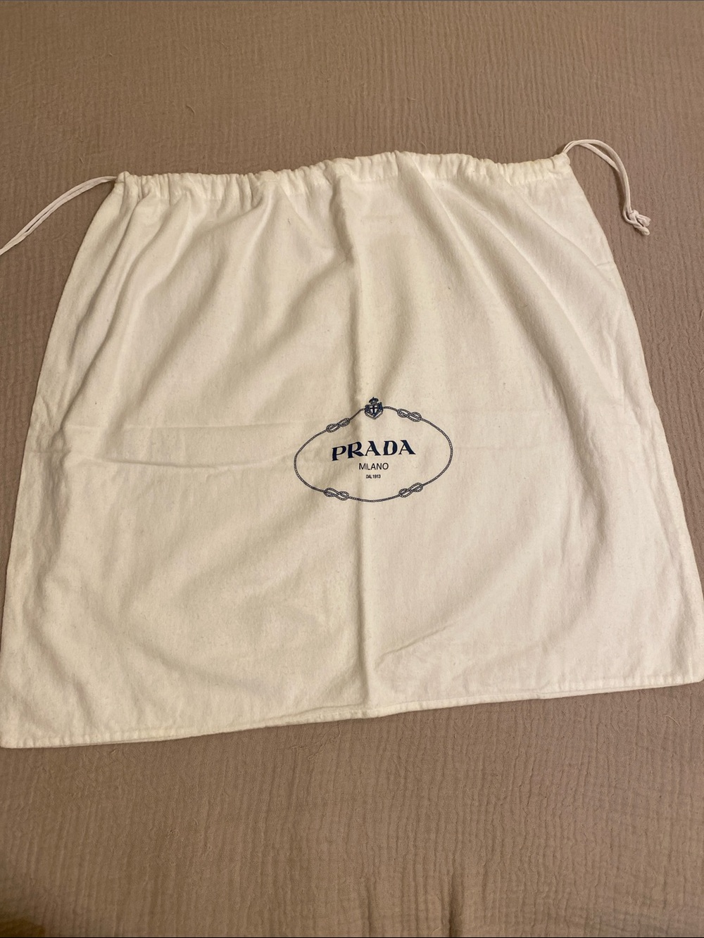 Prada large size dust bag . Perfect for travel or storage any essensial.